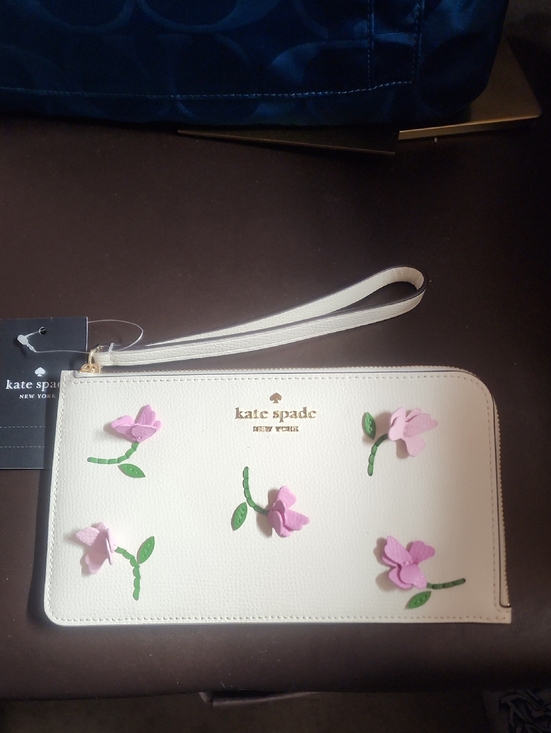 kate spade Handbags - Kate Spade Medium L Zip cream Leather wristlet with pink floral appliqués Nwt